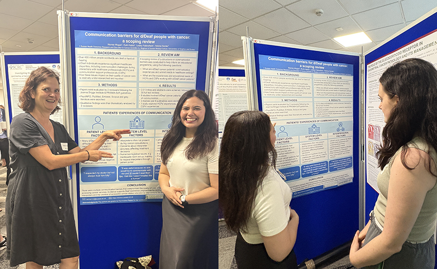 Helena and Niomie standing next to the CANCODE poster